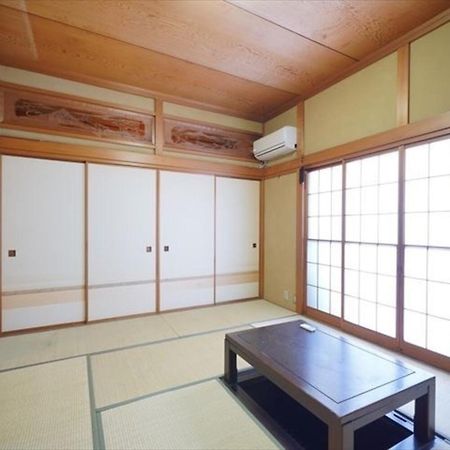 海と駅の近くのゲストハウス海悠 Itō Eksteriør billede
