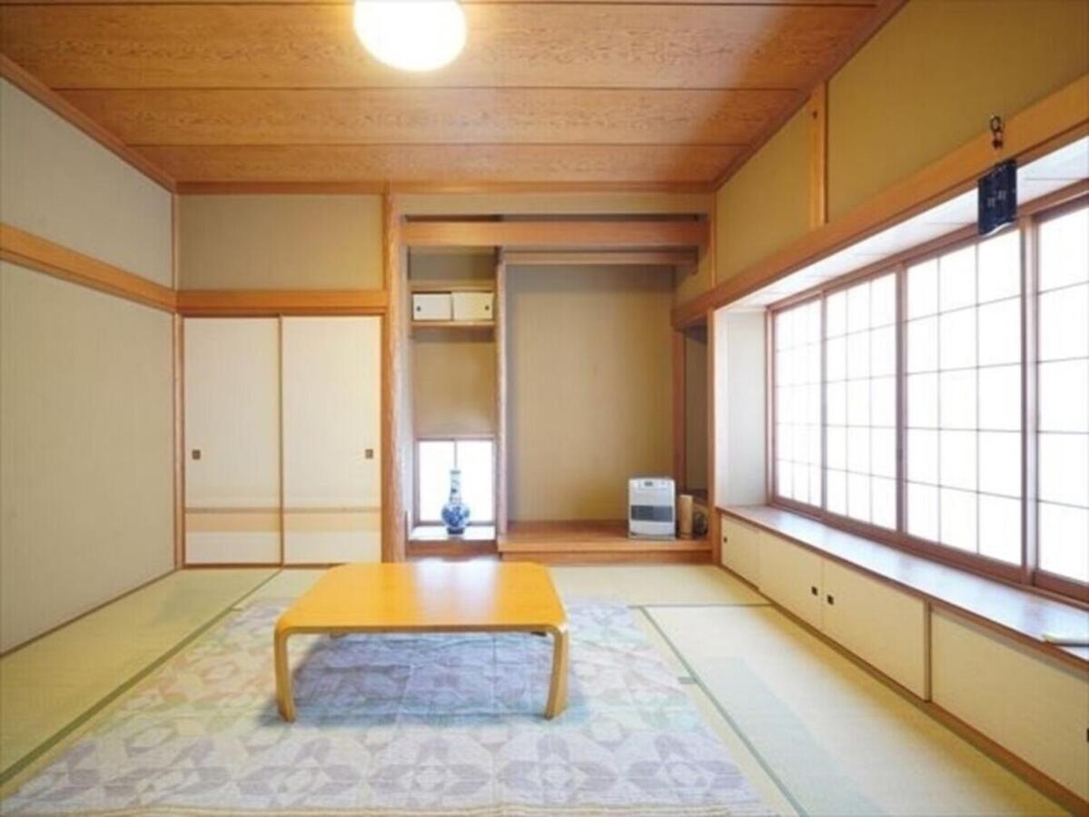 海と駅の近くのゲストハウス海悠 Itō Eksteriør billede